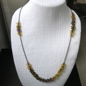 Long asymmetrical beaded necklace